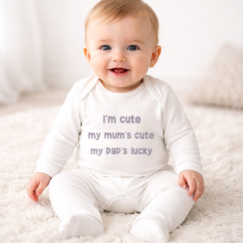 I’m Cute My Mum’s Cute My Dad’s Lucky – White Baby Romper 6–12 Months | Clearance £8.99