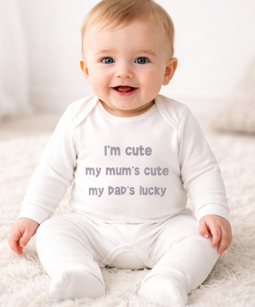I’m Cute My Mum’s Cute My Dad’s Lucky – White Baby Romper 6–12 Months | Clearance £8.99
