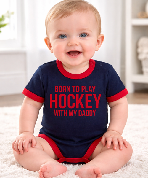 Né pour jouer au hockey avec mon papa 