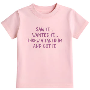 Pink t-shirt with text.