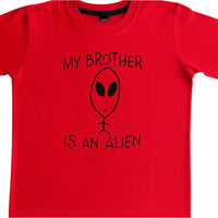 Red t-shirt with an alien graphic and text on a white background