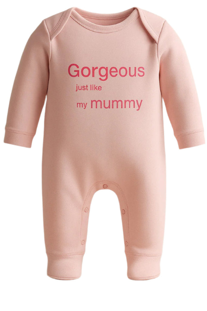 Pink baby onesie with text on a white background