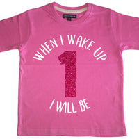 T-shirt enfant rose bonbon 'Quand je me réveille, je serai...' avec imprimé pailleté blanc et rose 