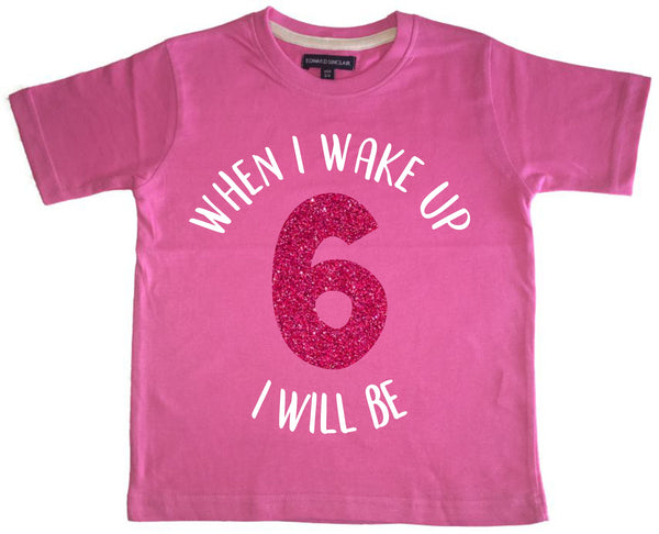T-shirt enfant rose bonbon 'Quand je me réveille, je serai...' avec imprimé pailleté blanc et rose 