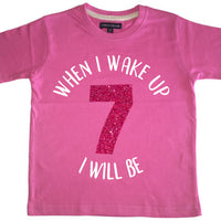 T-shirt enfant rose bonbon 'Quand je me réveille, je serai...' avec imprimé pailleté blanc et rose 